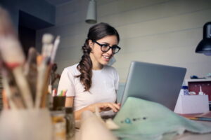 photo-of-woman-using-her-laptop-running-a-small-business