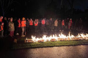 Starting the fire at Maggie's firewalk | Randall & Payne