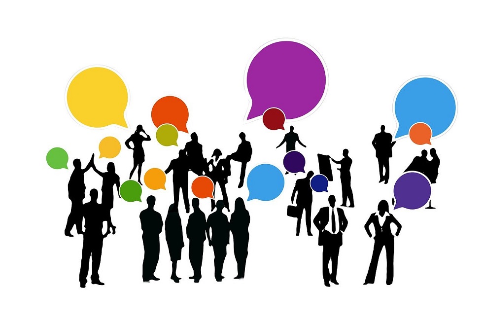 Figures with speech bubbles to represent business networking